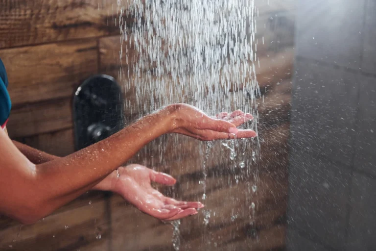 Woman usinf filtered shower head